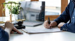 businessman and lawyer discuss the contract document treaty of the law sign a contract business photo